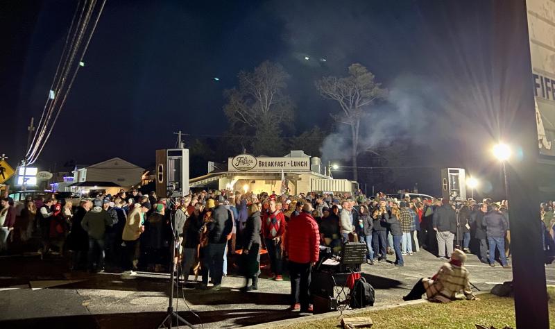 Revelers enjoy food, beverages, a bonfire and music by DJ Manny Mann.